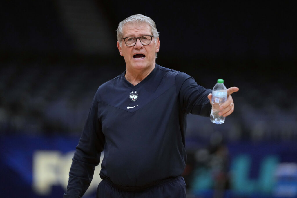 Geno Auriemma coaches during a practice before the Final Four